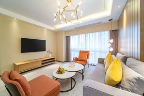 Luxurious two-bedroom apartment(Kitchen, Fridge) | Living room | 50-inch LCD TV with satellite channels, TV, pay movies - Kare Hotels (Shenzhen)