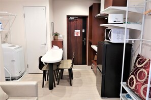 Apartment, Non Smoking (203) | Living area | 32-inch flat-screen TV with cable channels, TV - Tamade Sakura House (Osaka)