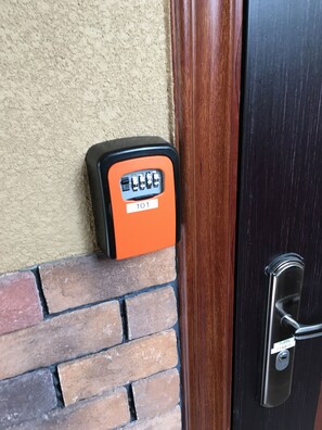 A door with a keypad lock labeled "101" and a sign that says "TURN 2 TIMES".