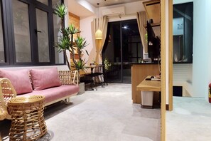 Apartment, 1 Bedroom (Rooftop Garden) | Living area | Flat-screen TV