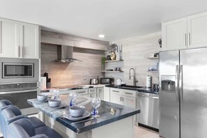 Fridge, microwave, oven, stovetop - The Summit 616 - Remodeled Waterfront Condo (Panama City)