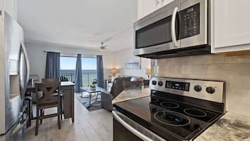 Coffee/tea maker, fridge, microwave, oven