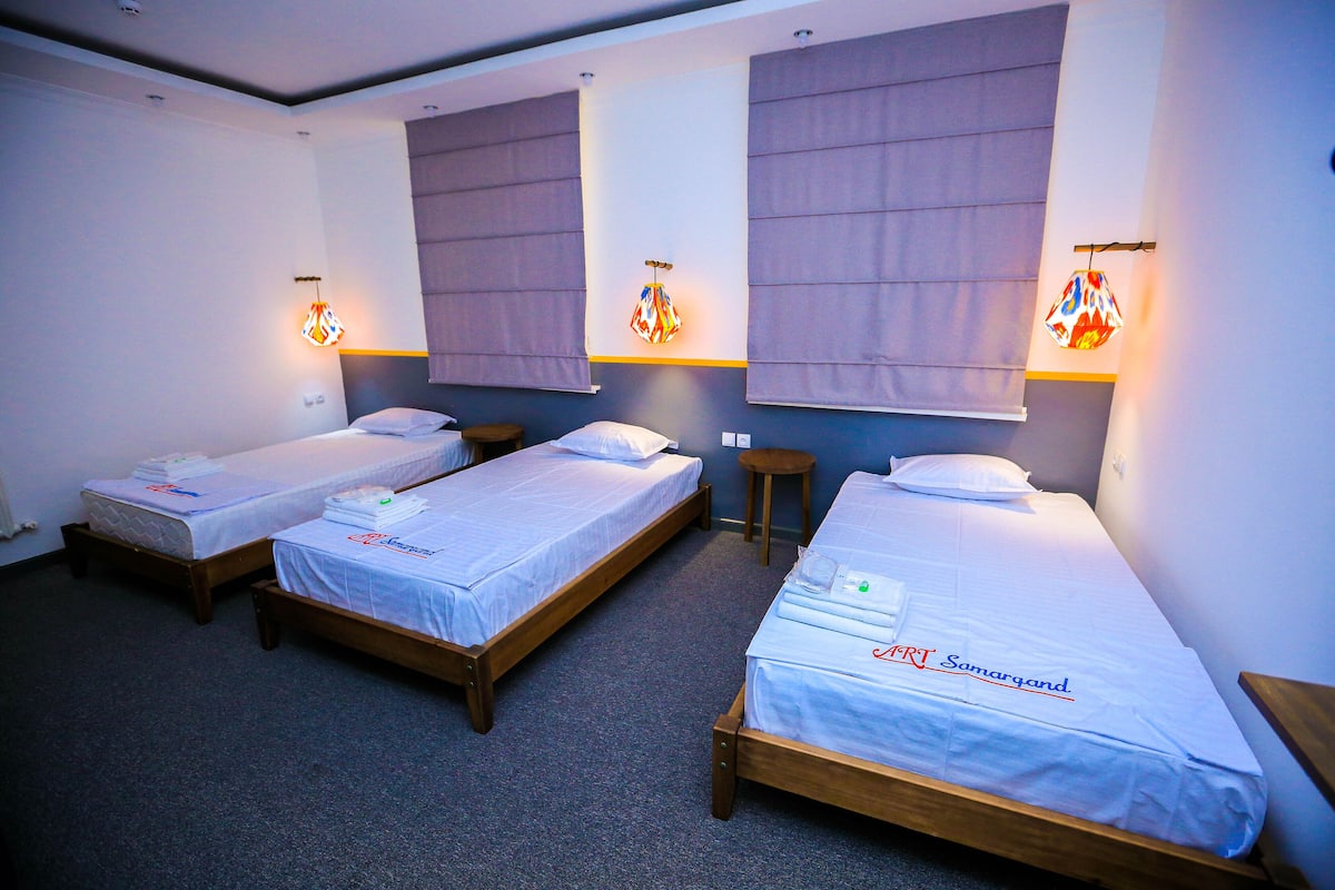 Comfort Triple Room | Premium bedding, down comforters, memory foam beds, WiFi (free)
