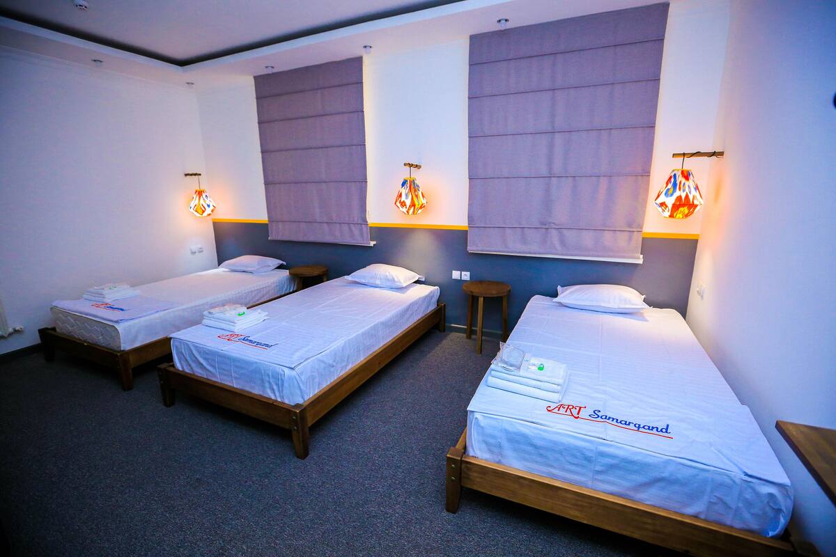Comfort Triple Room | Premium bedding, down duvets, memory-foam beds, free WiFi