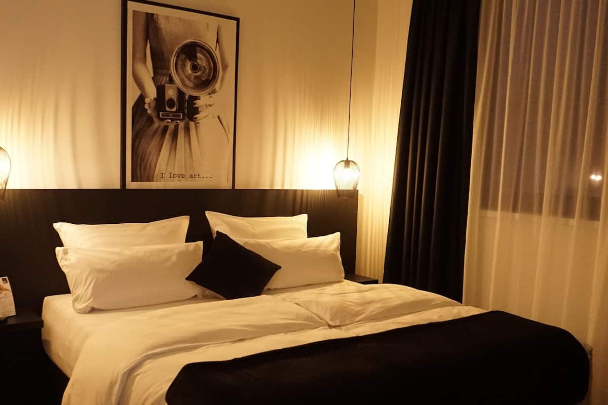 In-room safe, desk, blackout curtains, iron/ironing board (on request)