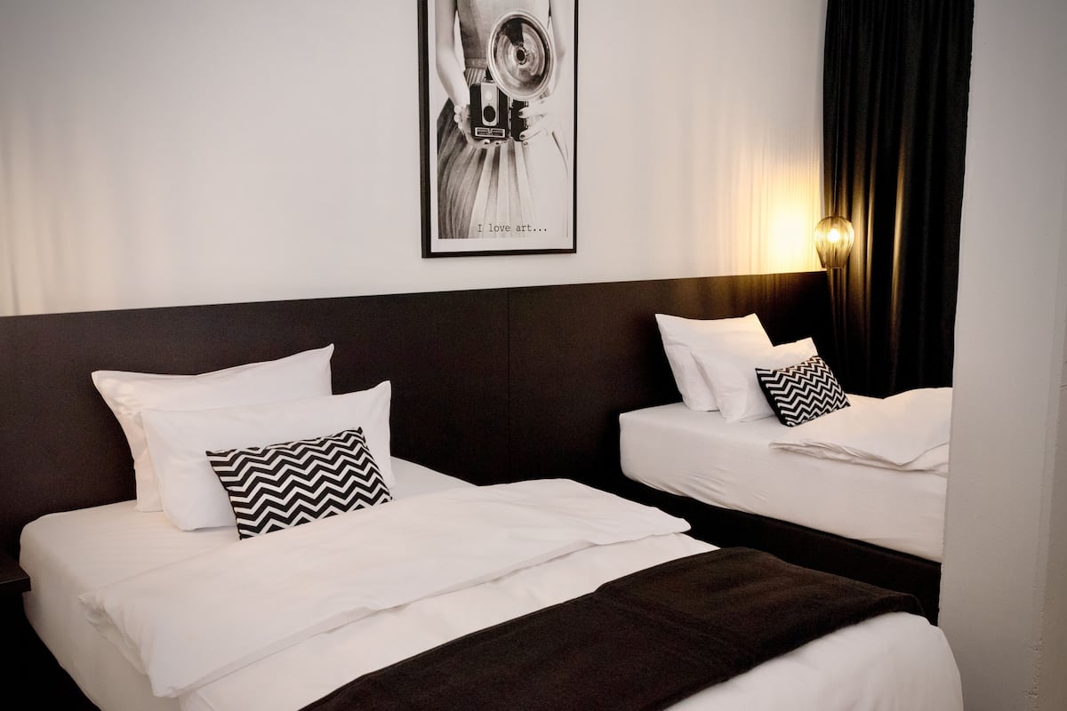 Twin Room, Balcony | In-room safe, desk, blackout curtains, iron/ironing board (on request)
