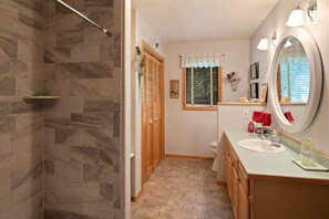 Banheira, secador de cabelo