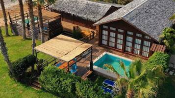 Family Bungalow, 3 Bedrooms, Beach View | Minibar, iron/ironing board (on request), bed sheets