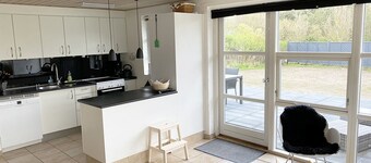 Attractive holiday home on a lawn, with window front including WiFi, annex
