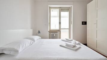 2 habitaciones, tabla de planchar con plancha, wifi y ropa de cama