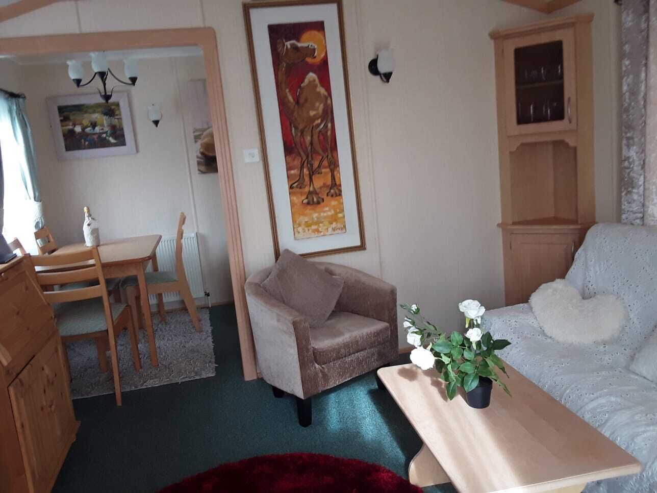 Luxury Cabin, 2 Bedrooms | Living area | Flat-screen TV