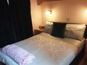 Cabana superluxo, 2 quartos | 2 quartos, ferros/tábuas de passar roupa, roupa de cama