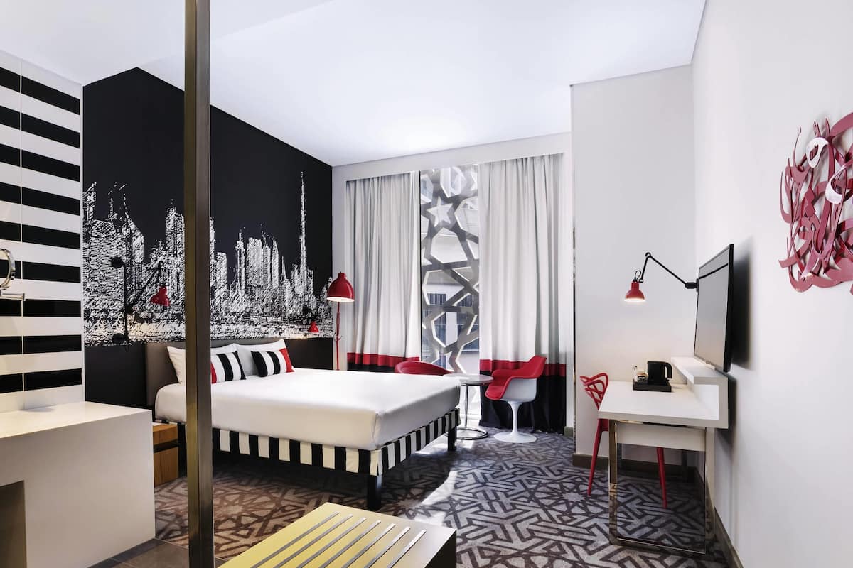 standard room, 1 double bed with free airport transfer & shuttle to la mer & malls | in-room safe, individually decorated, desk, laptop workspace