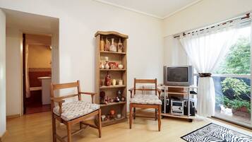 Apartemen, 1 kamar tidur | Area keluarga | TV