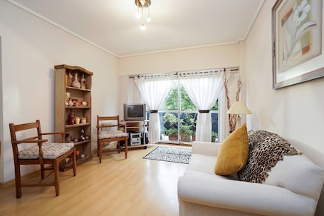 Apartment, 1 Bedroom | Living area | TV