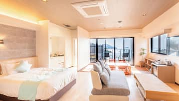 Modern western junior suit room,Non-smoking with open air-bath | Premium bedding, down comforters, pillowtop beds, in-room safe