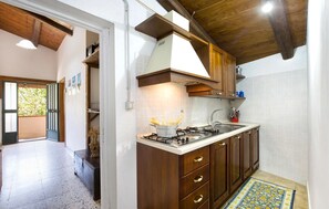 Fridge, stovetop, coffee/tea maker, cookware/dishes/utensils