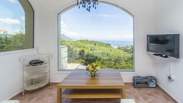 Superior-Penthouse, 1 Schlafzimmer, Whirlpool, Meerblick | Wohnbereich