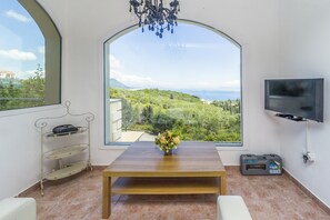Superior Penthouse, 1 Bedroom, Jetted Tub, Sea View | Living area | 32-inch flat-screen TV with satellite channels, TV - Spileo House Boutique Apartments - Adults Only (Corfu)
