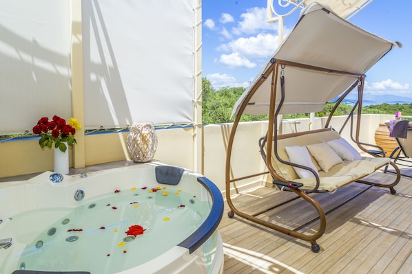Superior Penthouse, 1 Bedroom, Jetted Tub, Sea View | Premium bedding, in-room safe, laptop workspace, blackout drapes