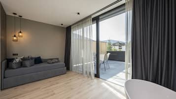 Apartment | Living area | 43-inch flat-screen TV with cable channels