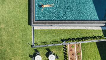 Outdoor pool, open 10:00 AM to 8:00 PM, pool umbrellas, sun loungers