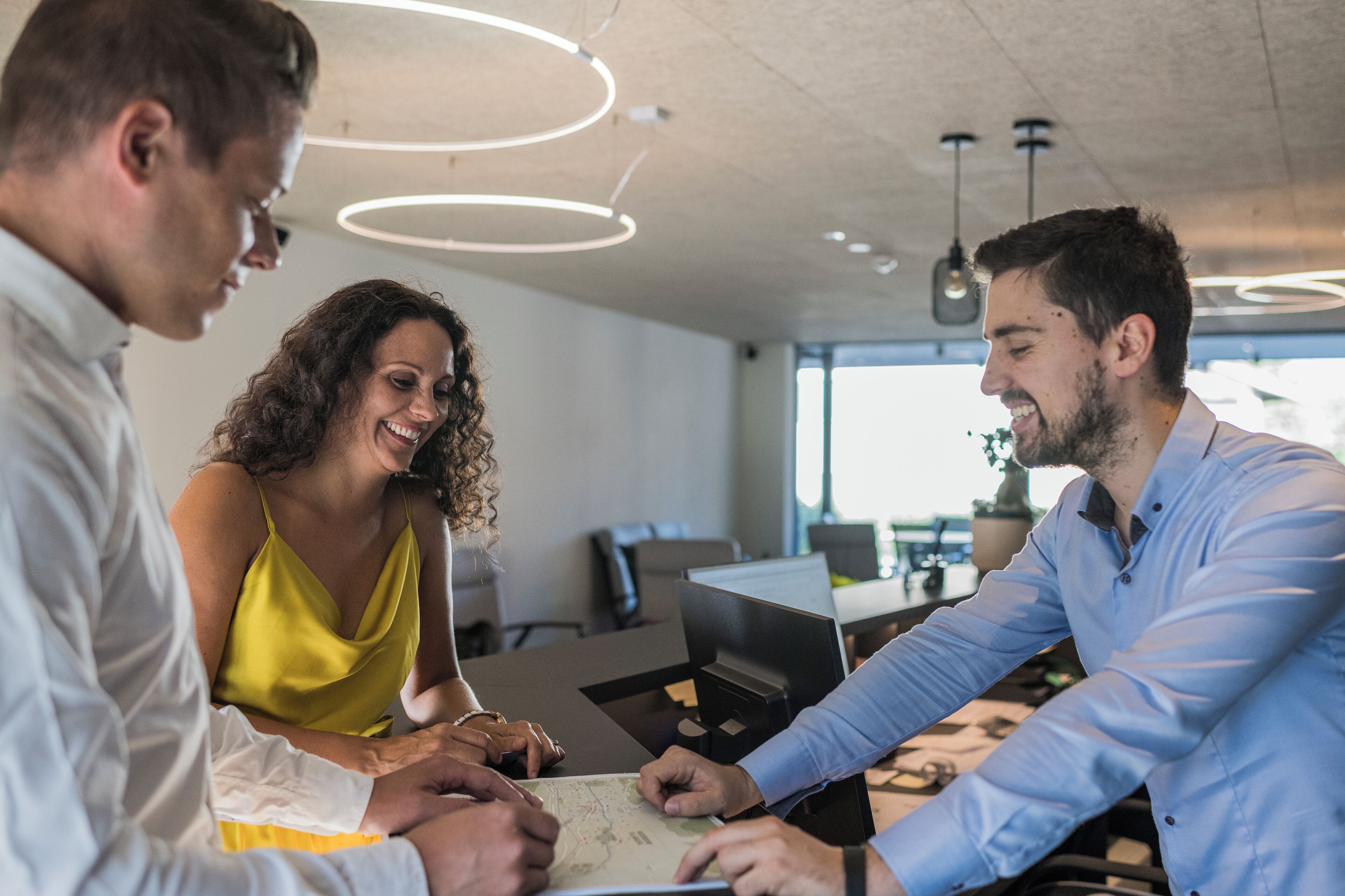 A modern office space with a collaborative meeting setup.