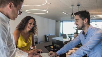 A modern office space with a collaborative meeting setup.