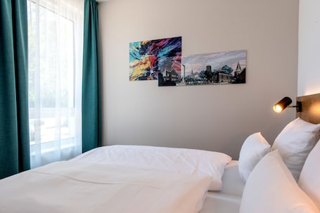 Premium bedding, in-room safe, desk, laptop workspace