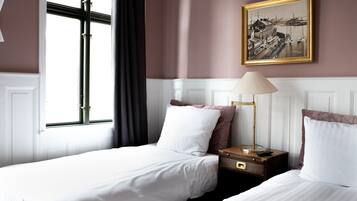 Twin Room | Desk, blackout drapes, iron/ironing board, free WiFi