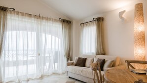 Apartment, 2 Bedrooms (Cozy Sherden) | Living area | 60-cm LCD TV with digital channels, TV - Villaggio Sherden (Golfo Aranci)