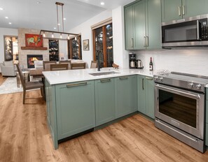 Condo, 2 Bedrooms | Private kitchen | Fridge, microwave, oven, dishwasher