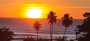 On the beach, sun loungers, beach towels