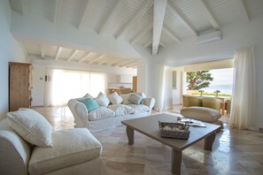 Apartment, 3 Bedrooms (S’Abba e Sa Pedra 1) | Living area | Flat-screen TV - S’Abba Seafront (Golfo Aranci)