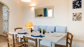 Apartment, 3 Bedrooms (S'Abba e Sa Pedra Giù) | In-room dining - Appartamenti S'abba e Sa Pedra (Golfo Aranci)