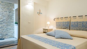 Apartment, 3 Bedrooms (S'Abba e Sa Pedra Giù) | 3 bedrooms, iron/ironing board, free WiFi, bed sheets - Appartamenti S'abba e Sa Pedra (Golfo Aranci)