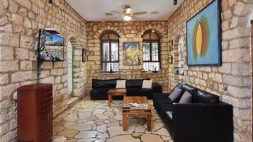 Villa | Living room | 32-inch LCD TV with satellite channels, TV