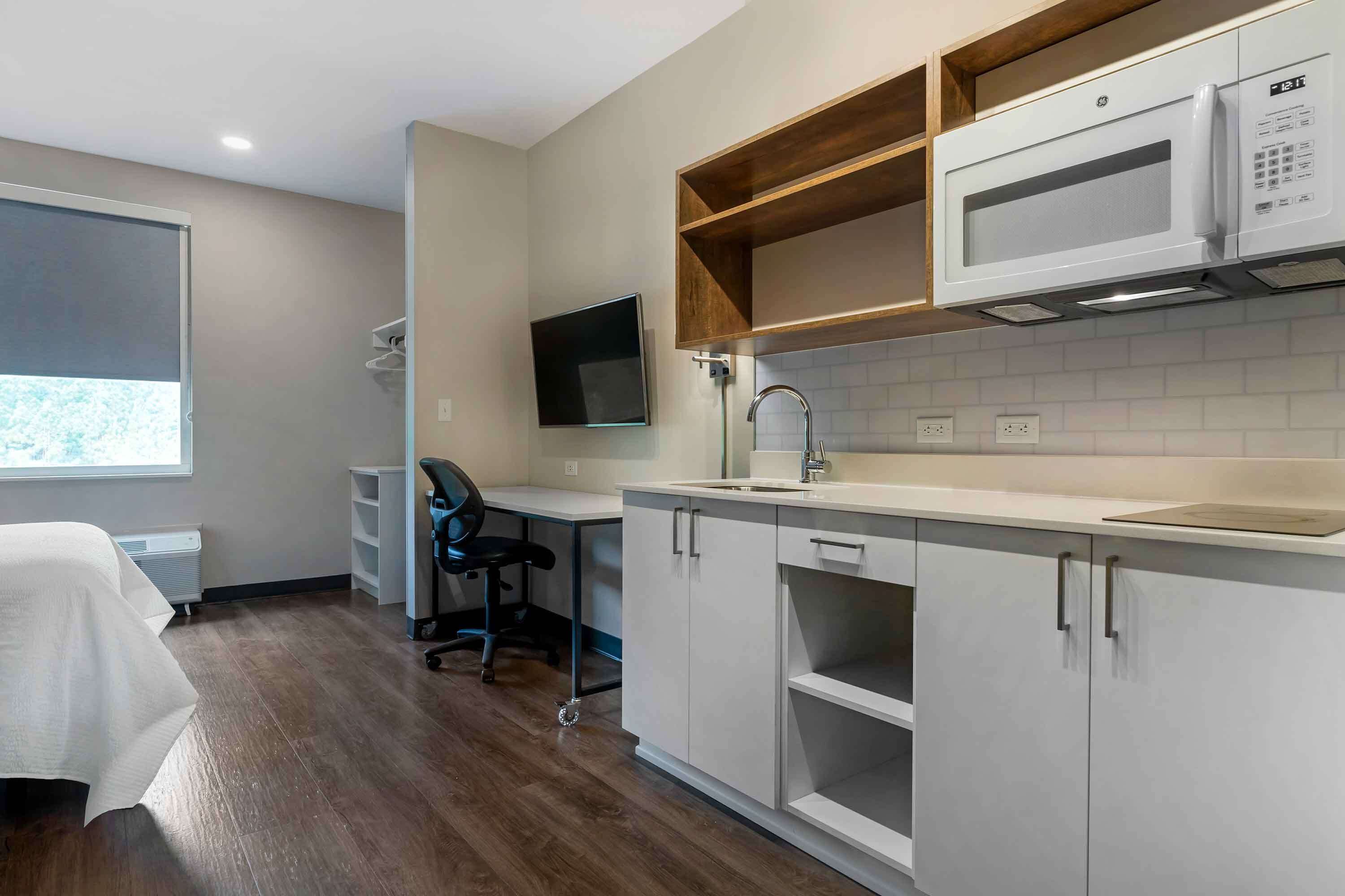 standard studio, 1 queen bed, non smoking, refrigerator & microwave | premium bedding, desk, laptop workspace, iron/ironing board