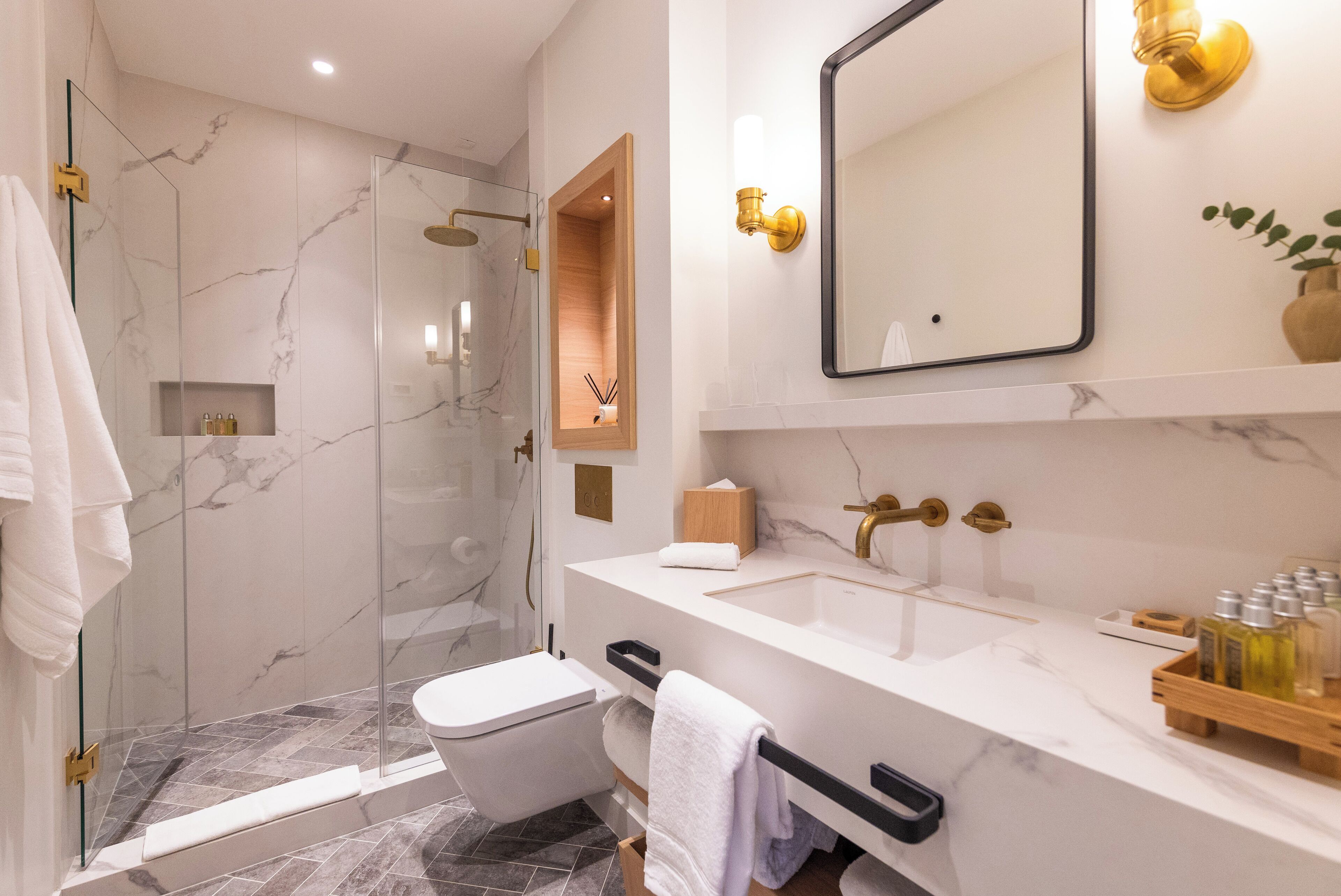 superior king room | bathroom | shower, hydromassage showerhead, free toiletries, hair dryer