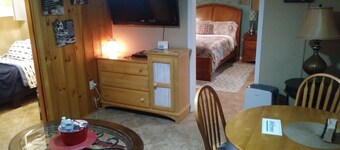 2 bedroom suite with a full kitchen, living room, and a full bathroom.