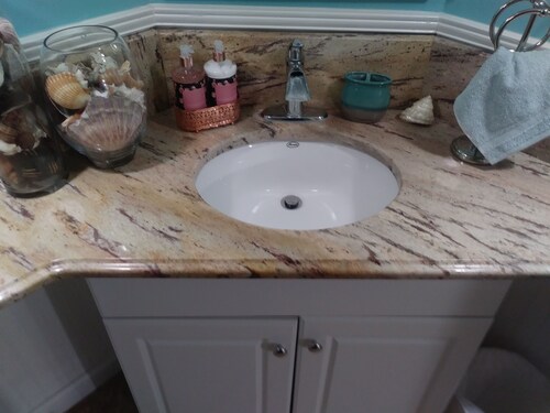 2 bedroom suite with a full kitchen, living room, and a full bathroom.