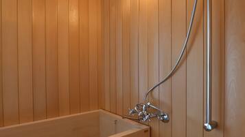 Combined shower/bathtub, hair dryer, slippers, electronic bidet