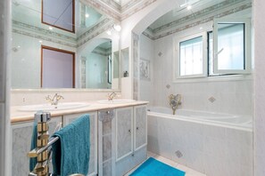 Hair dryer, towels, soap, shampoo