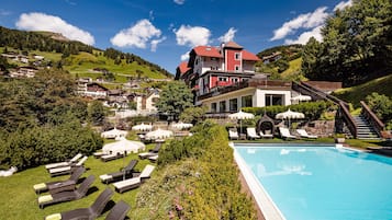 Outdoor pool, open 8:00 AM to 8:00 PM, pool umbrellas, pool loungers