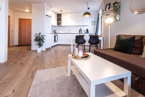 Exclusive-huoneisto, 1 makuuhuone | Oleskelualue | Taulutelevisio