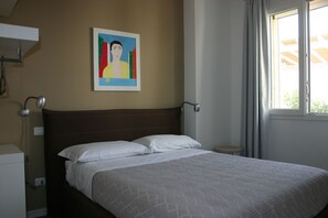 2 bedrooms, desk, iron/ironing board, travel cot