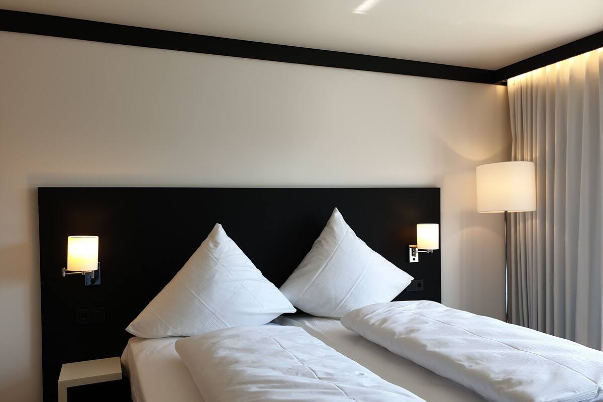 Hypo-allergenic bedding available, desk, blackout drapes, WiFi (free)