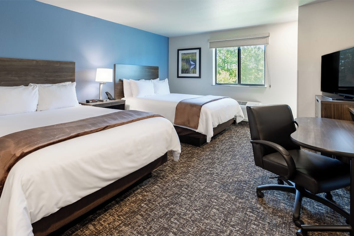 Premium bedding, pillowtop beds, desk, laptop workspace
