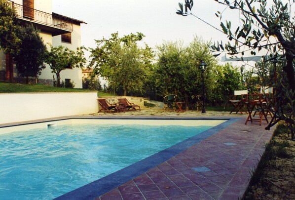 Seasonal outdoor pool, pool umbrellas, pool loungers