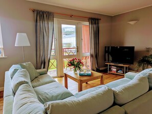 Apartament Comfort | Sala d'estar | Televisor de pantalla plana 